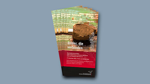 Flyer Kick-off A bunch of flyers on a grey background. The flyer shows a sealing and a brush on coded paper. The title reads "Bilder, die verbinden" meaning "Images that connect".
